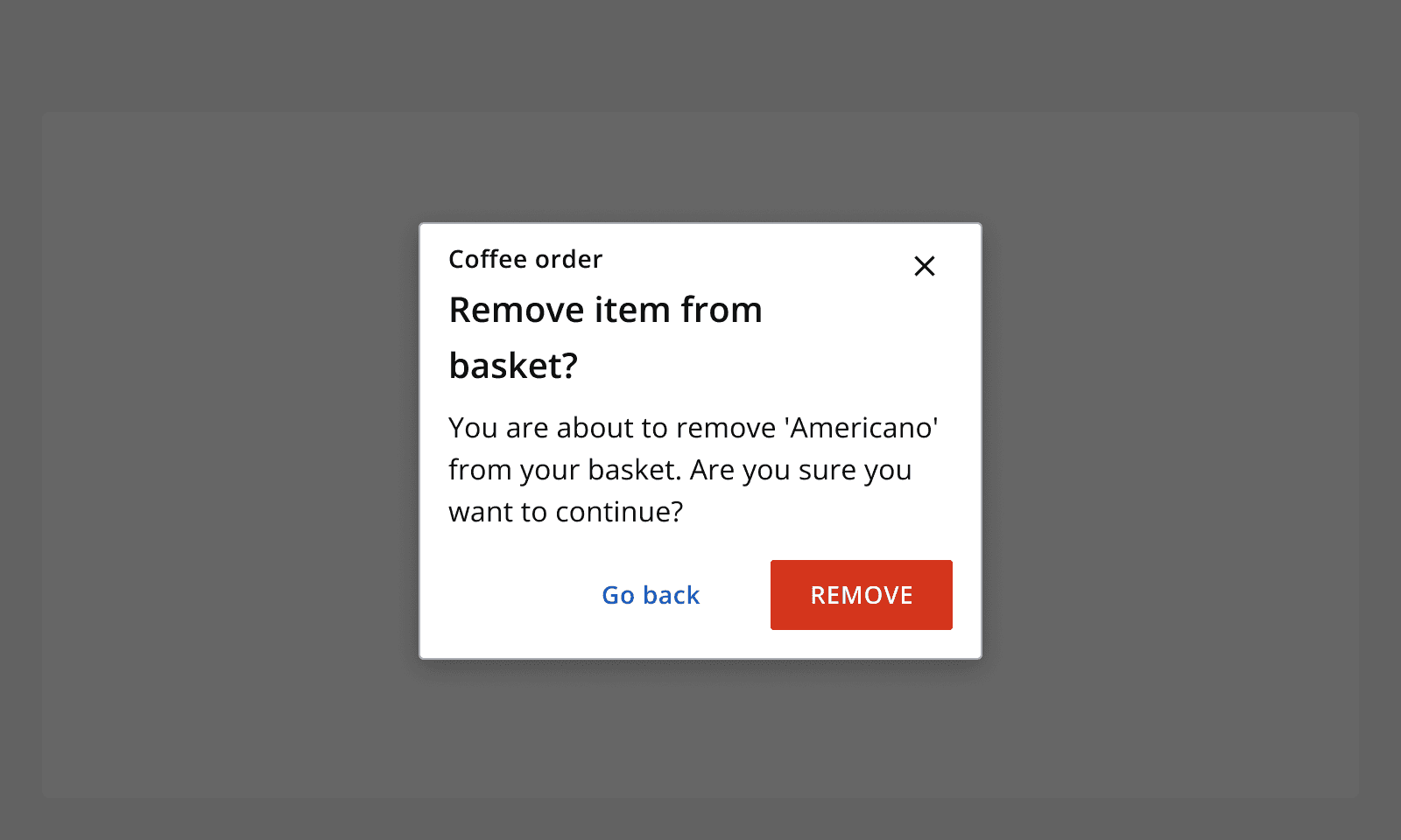 An example dialog for removing an item from a basket. It provides a destructive action button for 'Remove' and a secondary button for 'Go back'.